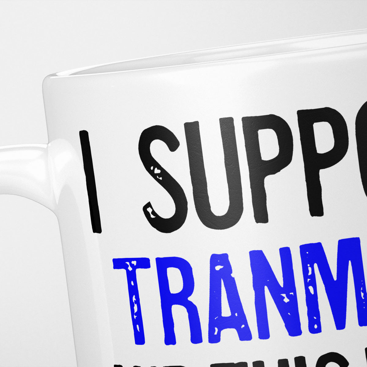 Close crop of the I Support Tranmere mug, 'I Support' in heavy black above the club name in blue, running off the edge of the frame