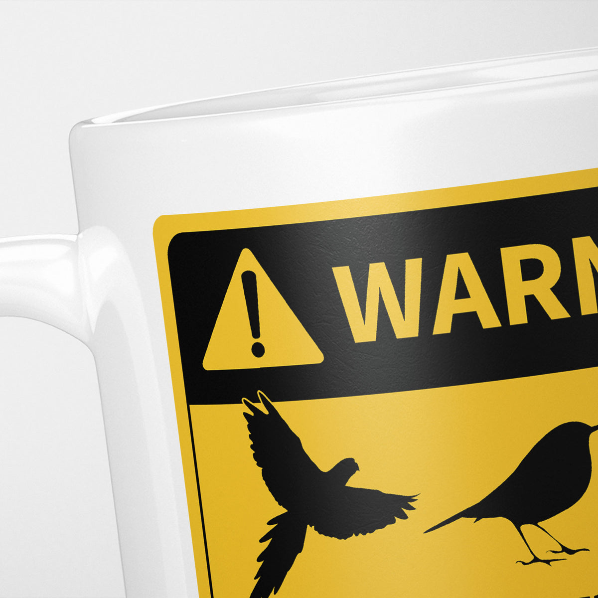 Close crop of the Birds warning sign, the hazard triangle and 'warning' above three bird silhouettes