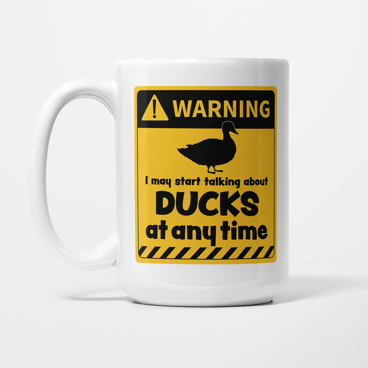 The 15oz Warning mug, white ceramic with a yellow and black warning sign showing a duck silhouette above 'I may start talking about Ducks at any time'