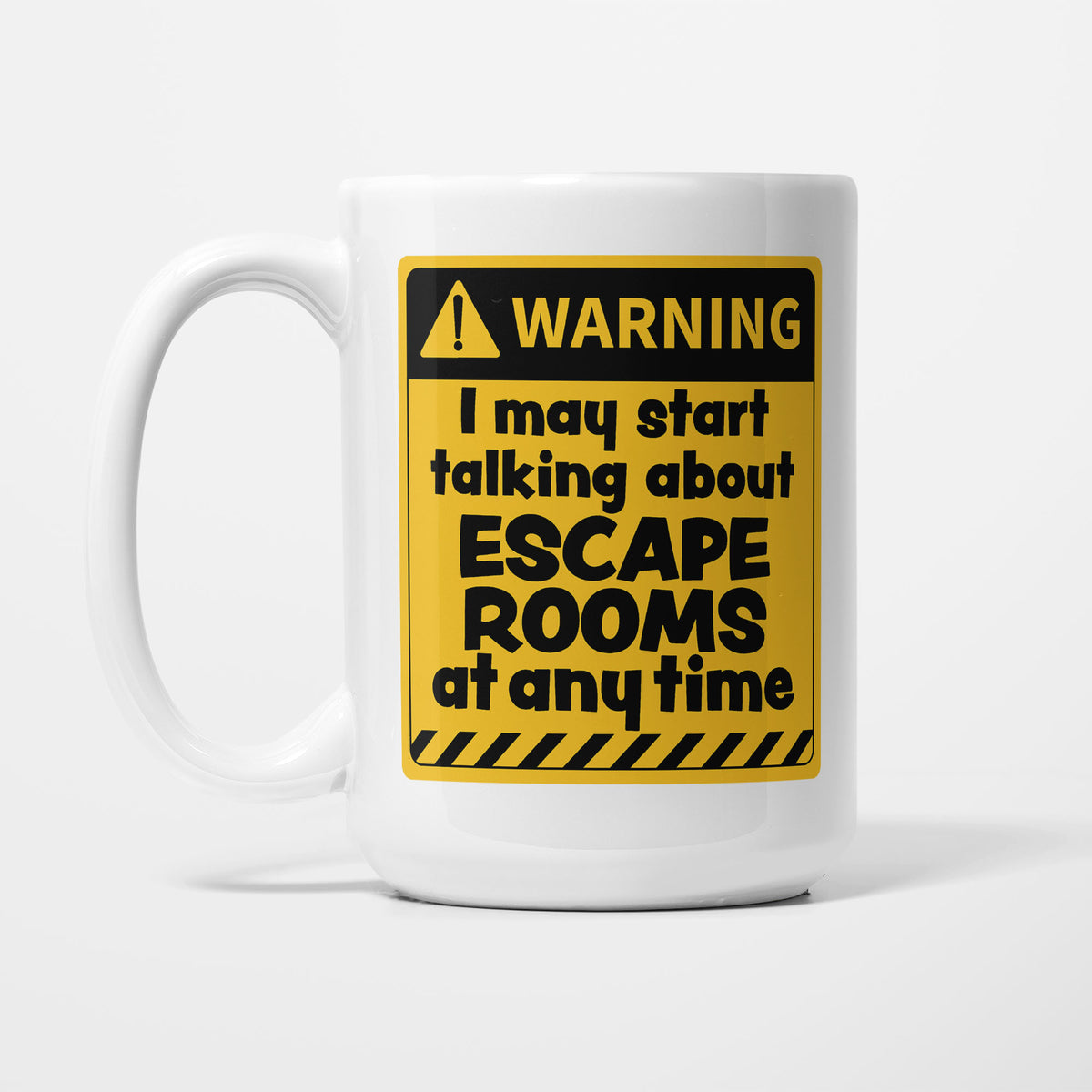 The 15oz Warning mug, white ceramic with a yellow and black warning sign reading 'I may start talking about Escape Rooms at any time'