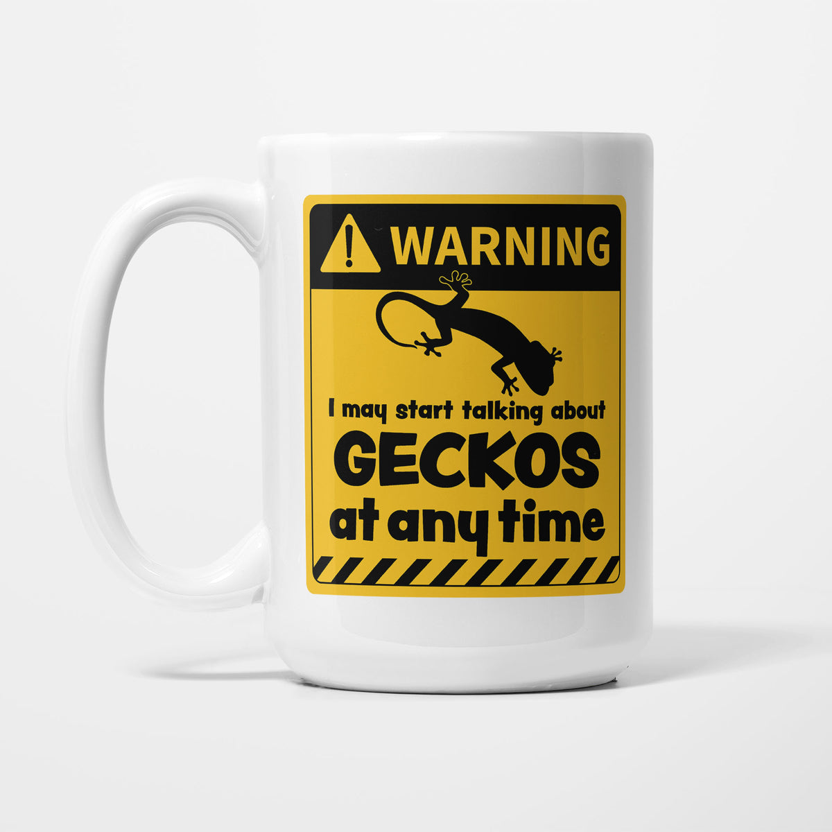 The 15oz Warning mug, white ceramic with a yellow and black warning sign showing a gecko silhouette above 'I may start talking about Geckos at any time'