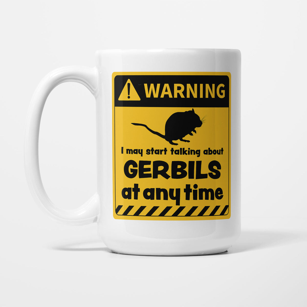 The 15oz Warning mug, white ceramic with a yellow and black warning sign showing a gerbil silhouette above 'I may start talking about Gerbils at any time'