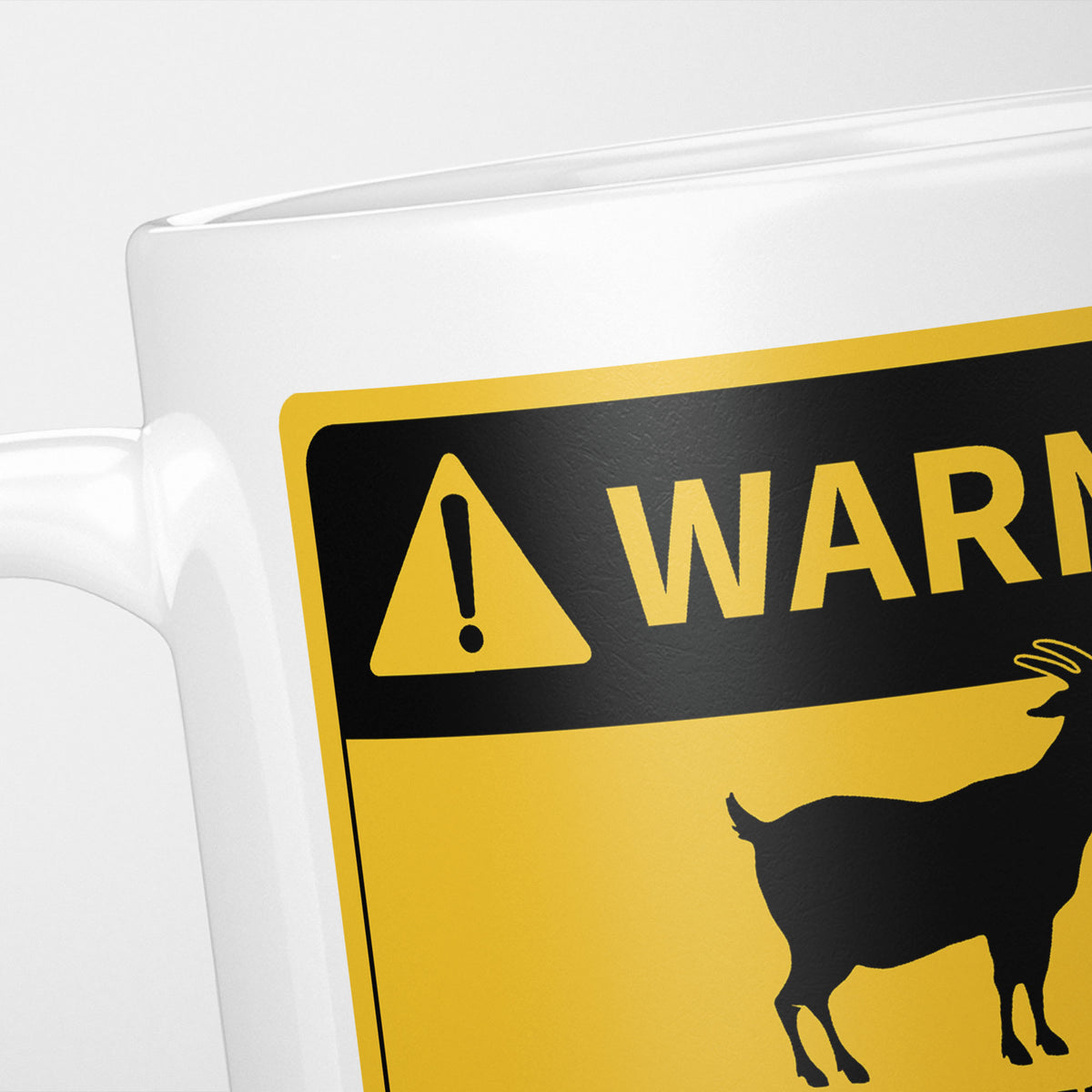 Close crop of the Goats warning sign, the hazard triangle and 'warning' above a goat silhouette