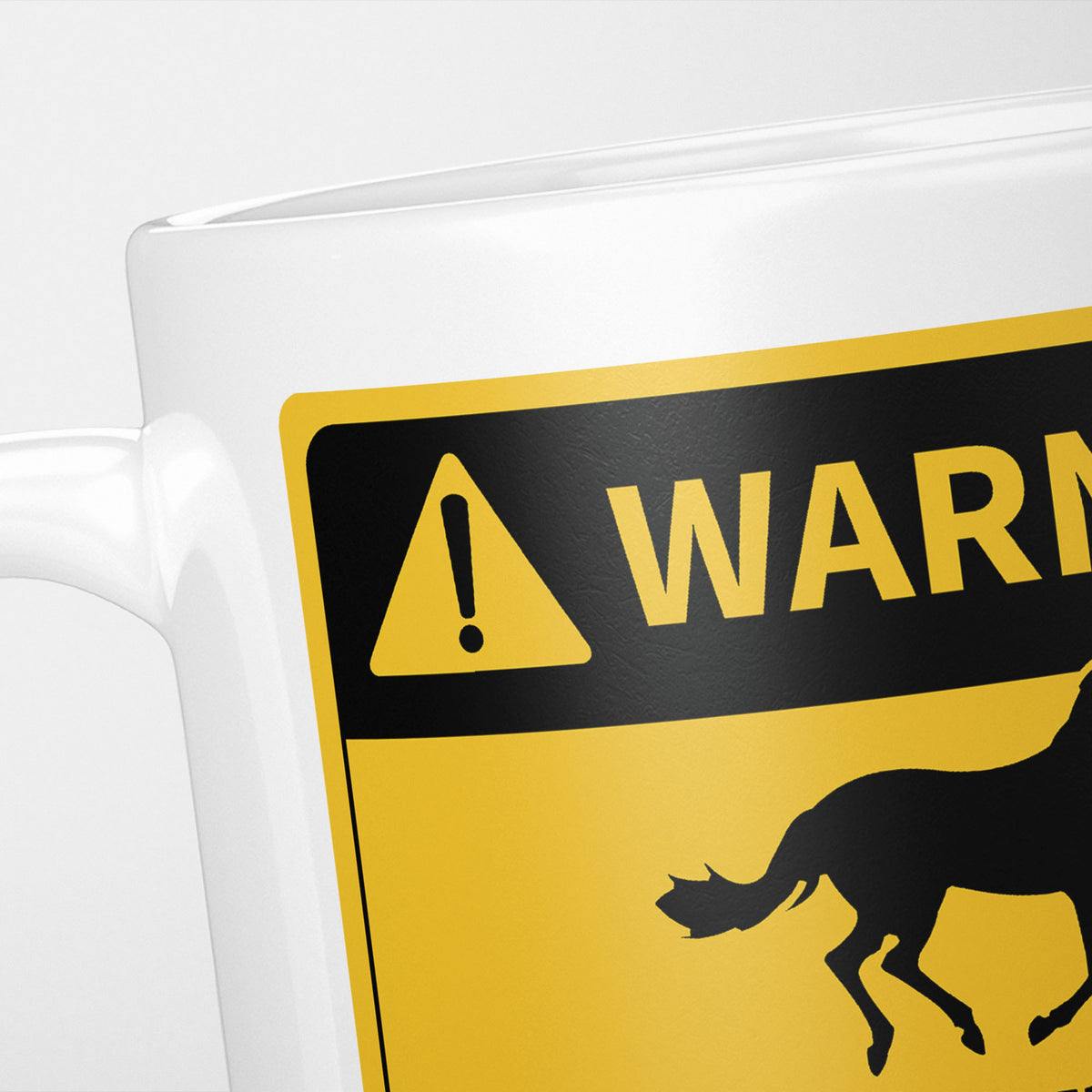 Close crop of the Horses warning sign, the hazard triangle and 'warning' above a horse silhouette