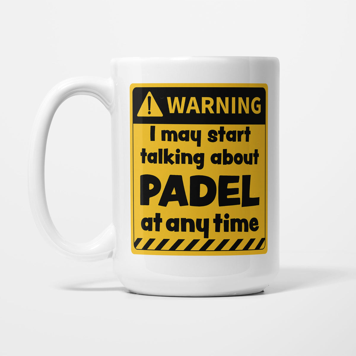 The 15oz Warning mug, white ceramic with a yellow and black warning sign reading 'I may start talking about Padel at any time'