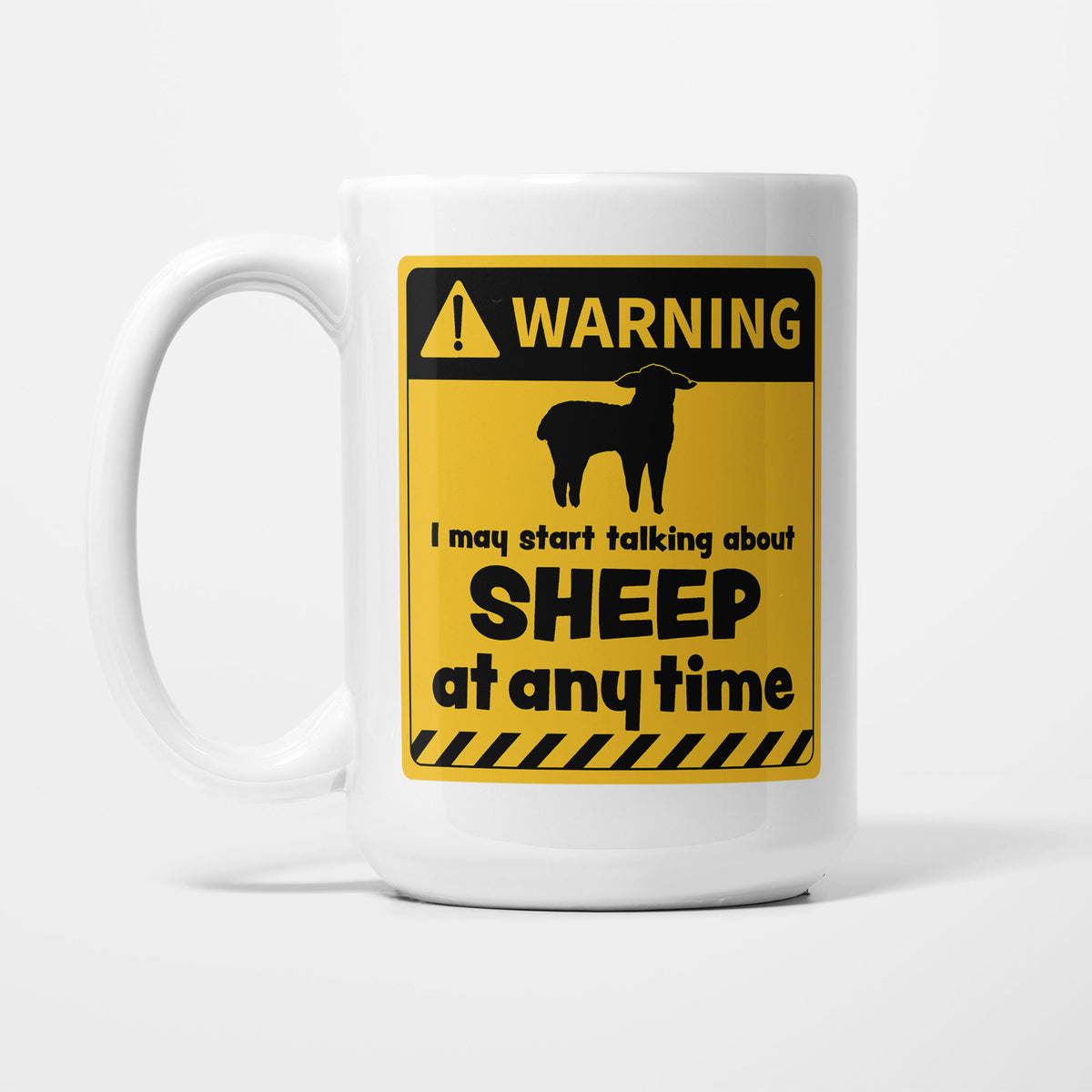 The 15oz Warning mug, white ceramic with a yellow and black warning sign showing a sheep silhouette above 'I may start talking about Sheep at any time'