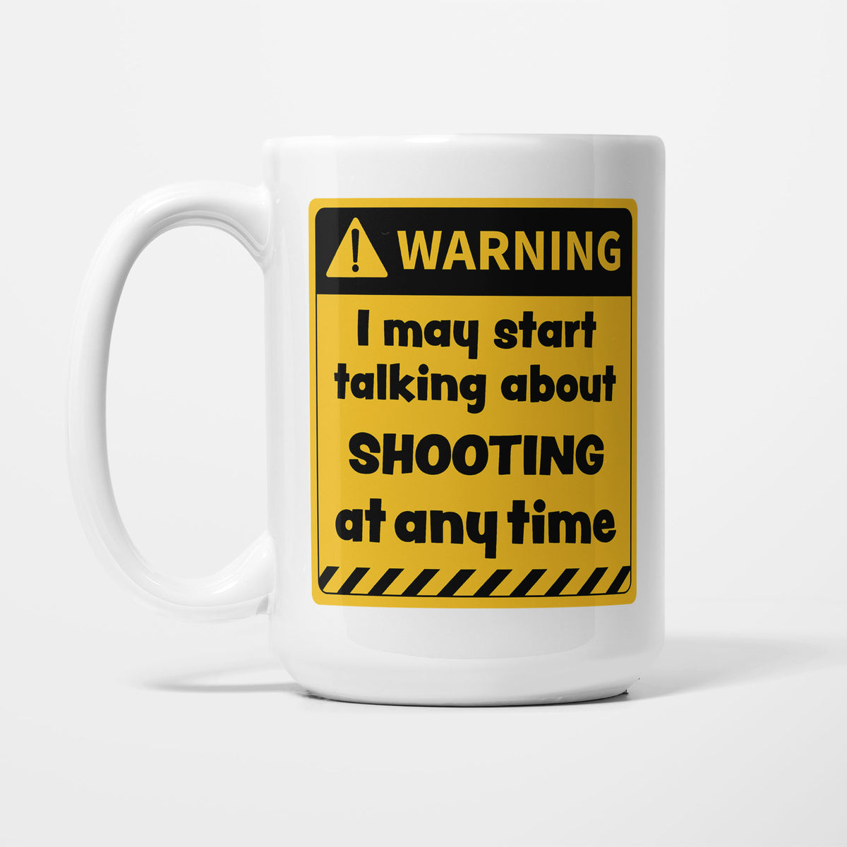The 15oz Warning mug, white ceramic with a yellow and black warning sign reading 'I may start talking about Shooting at any time'