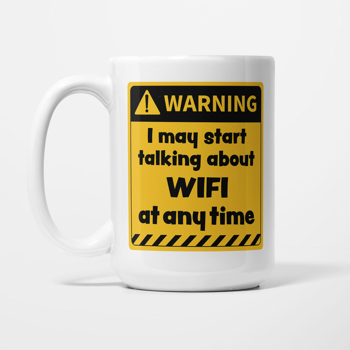 The 15oz Warning mug, white ceramic with a yellow and black warning sign reading 'I may start talking about WiFi at any time'