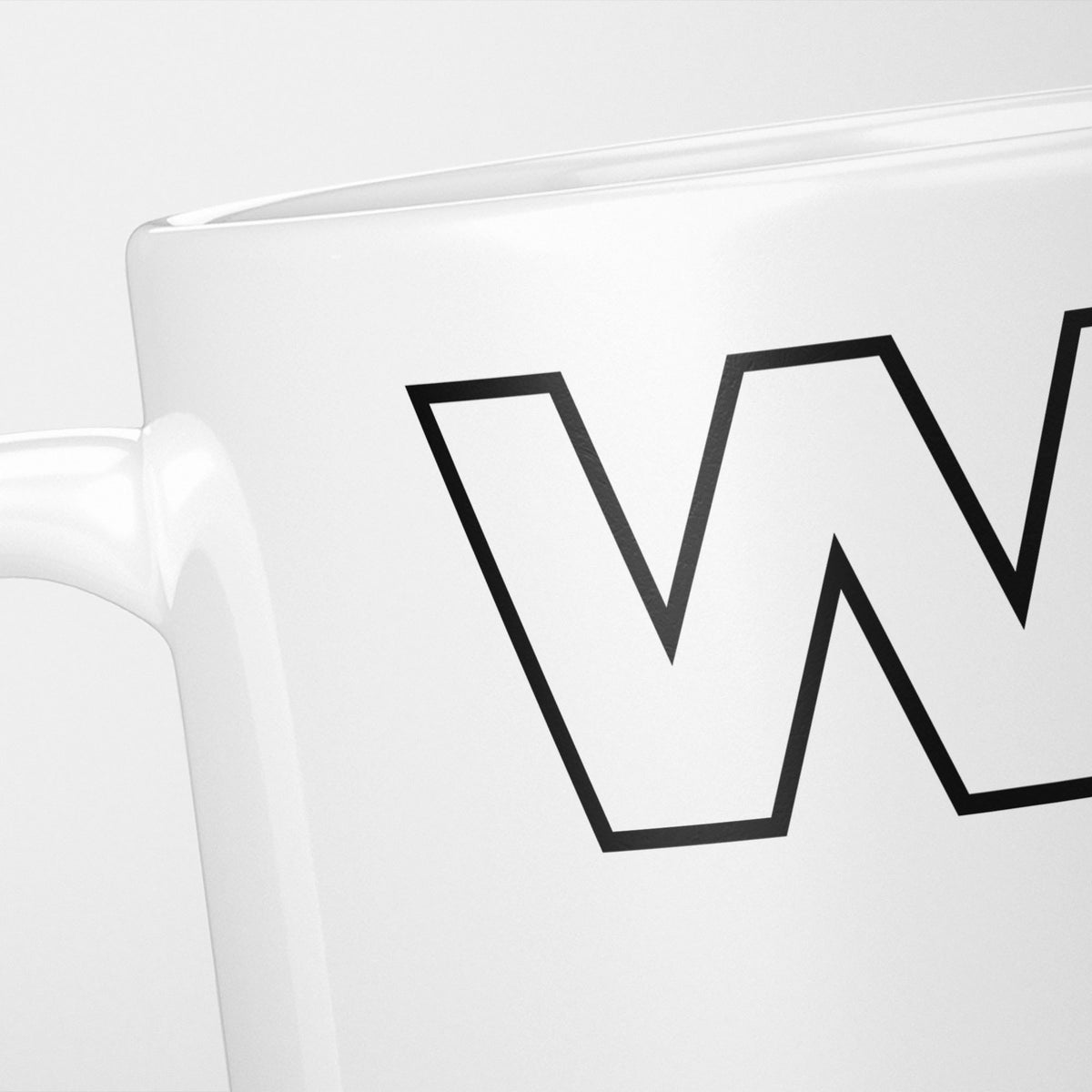 Close crop of the Wham! 1980s Music Icons mug, the outlined 'W' filling the frame