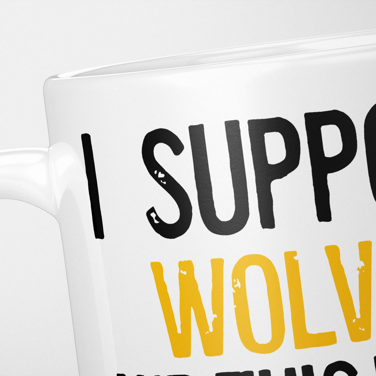 Close crop of the I Support Wolves mug, 'I Support' in heavy black above the club name in gold, running off the edge of the frame