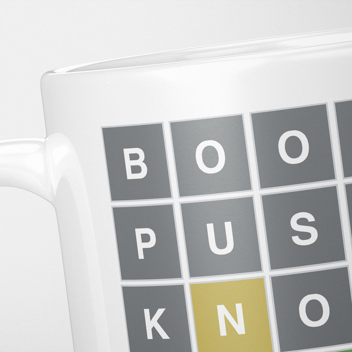Close crop of the Rude Wordle Game Swear Words mug, grey and green tiles reading BOO, PUS and KNO