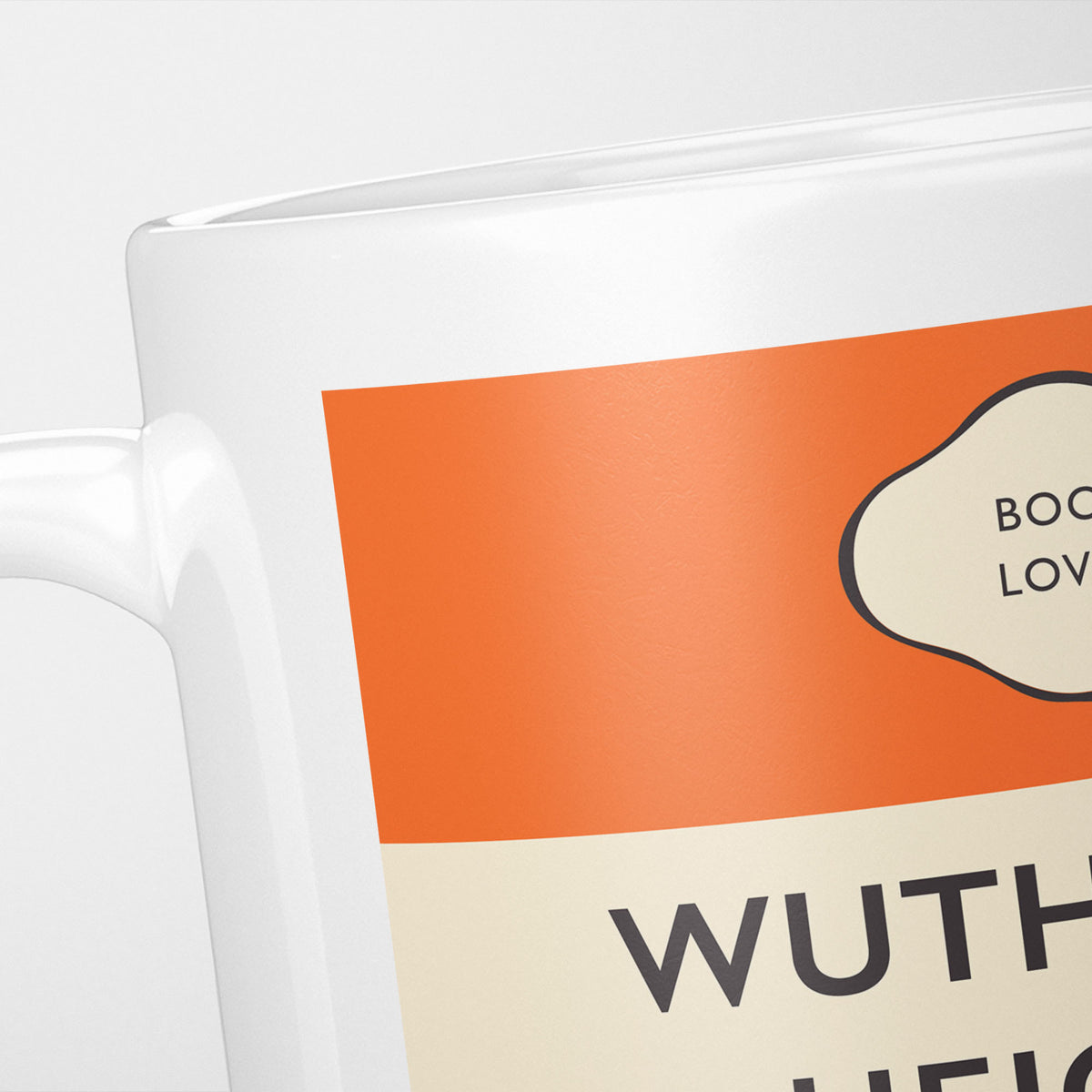 Close crop of the Wuthering Heights jacket, the orange band above the cream title panel, the lettering running off the frame