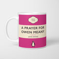 White ceramic mug printed with a vintage-style book cover design reading 'A Prayer For Owen Meany' by John Irving