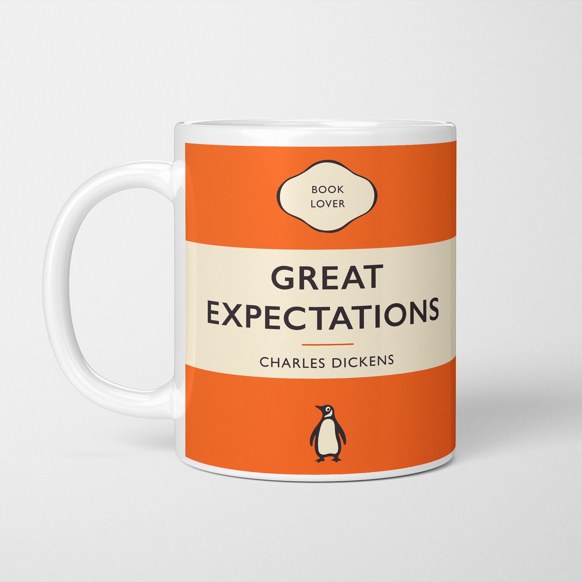 White ceramic mug printed with a vintage-style book cover design reading 'Great Expectations' by Charles Dickens