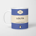 White ceramic mug printed as a vintage paperback jacket in blue and cream, reading 'Lolita' above Vladimir Nabokov